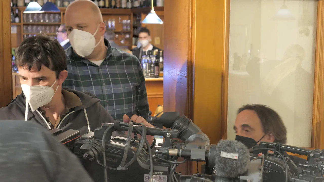 Camera crew in masks filming at the Gasthaus Grünauer, February 2021